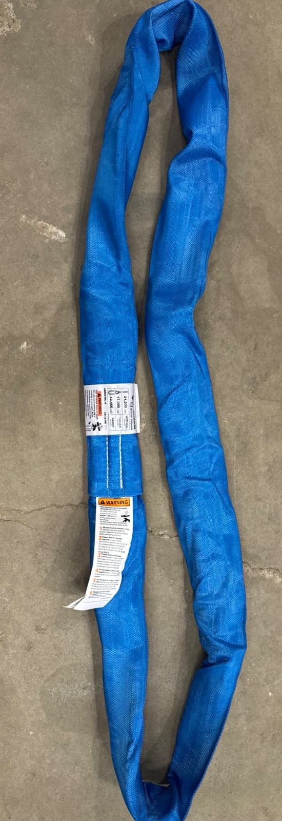 Blue endless round lifting sling with rated capacity tag