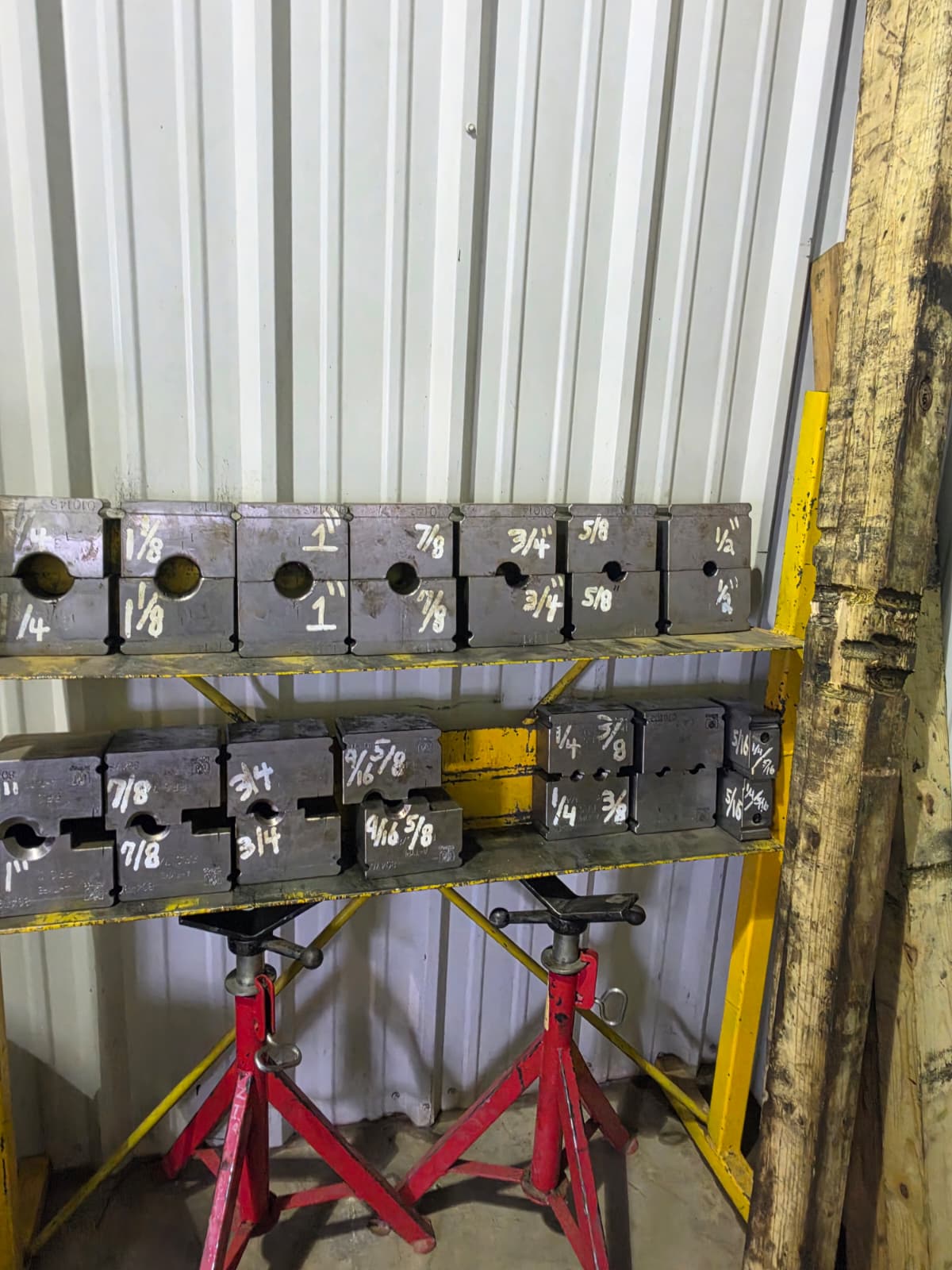 Rack of swage dies by size at Zia Wire Rope